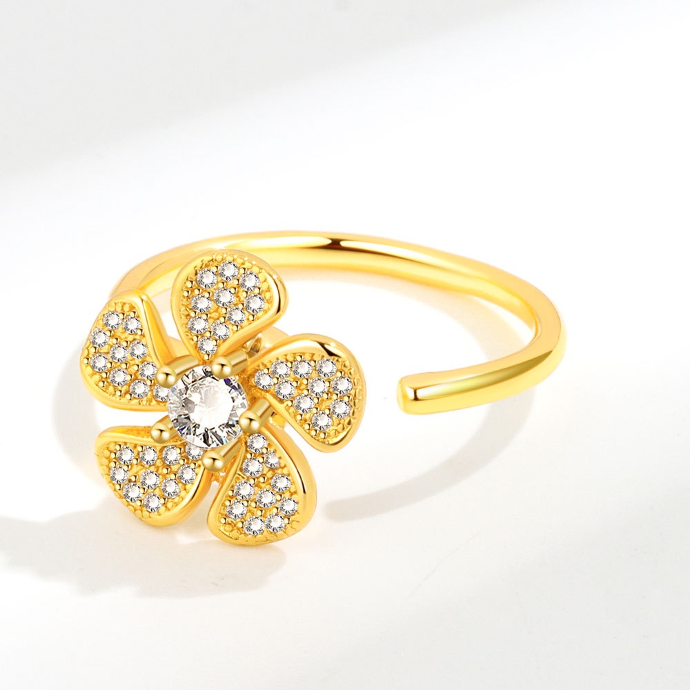 Nhẫn Hở Hình Hoa Nhỏ Dạng Xoay Đính Đá Zircon Thời Trang