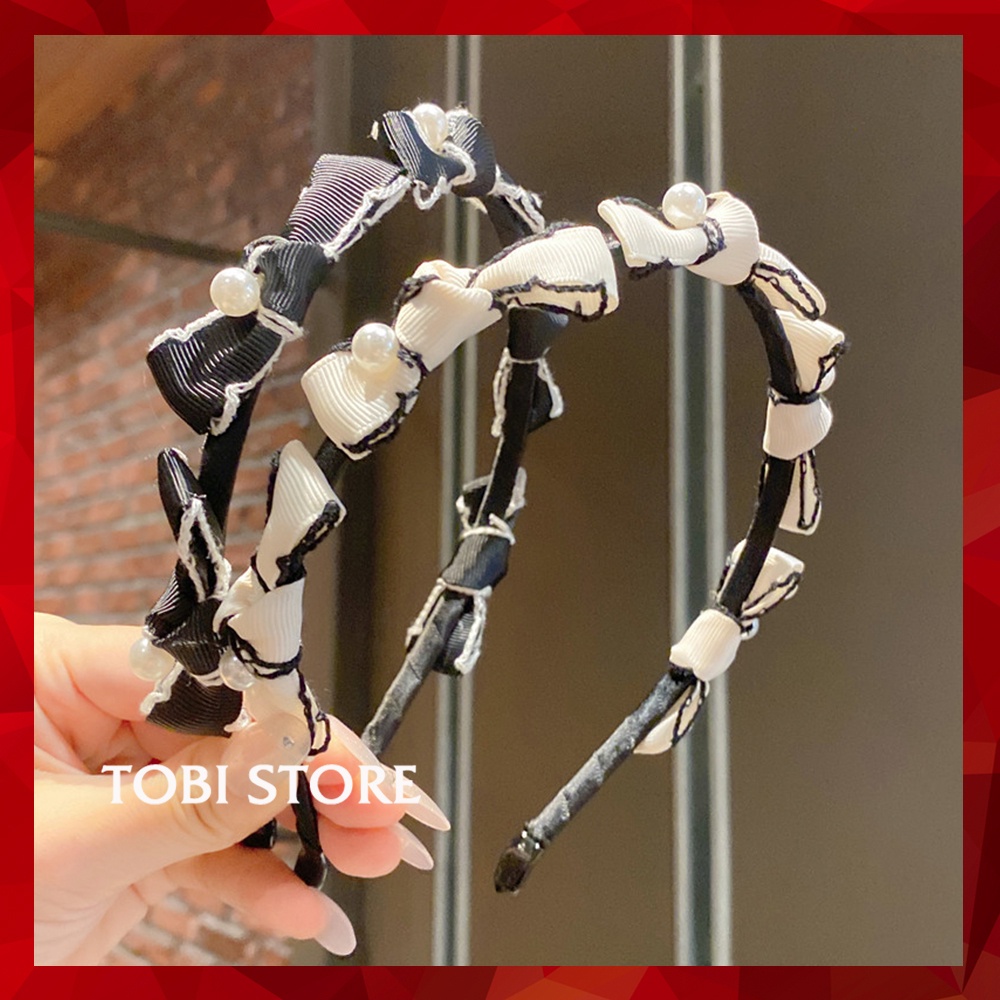 Bờm tóc đính nơ và ngọc trai nhân tạo trắng và đen TB578