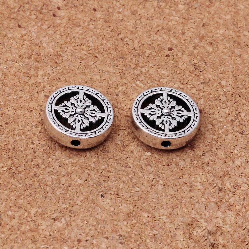 Charm bánh xe luân hồi - KL021