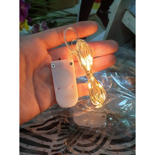 Đèn led nhấp nháy 3 chế độ kèm pin màu vàng