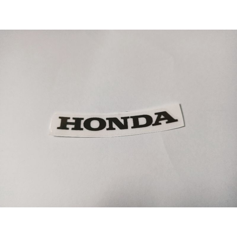 Tem trang trí mặt nạ xe Honda màu đen nền trong