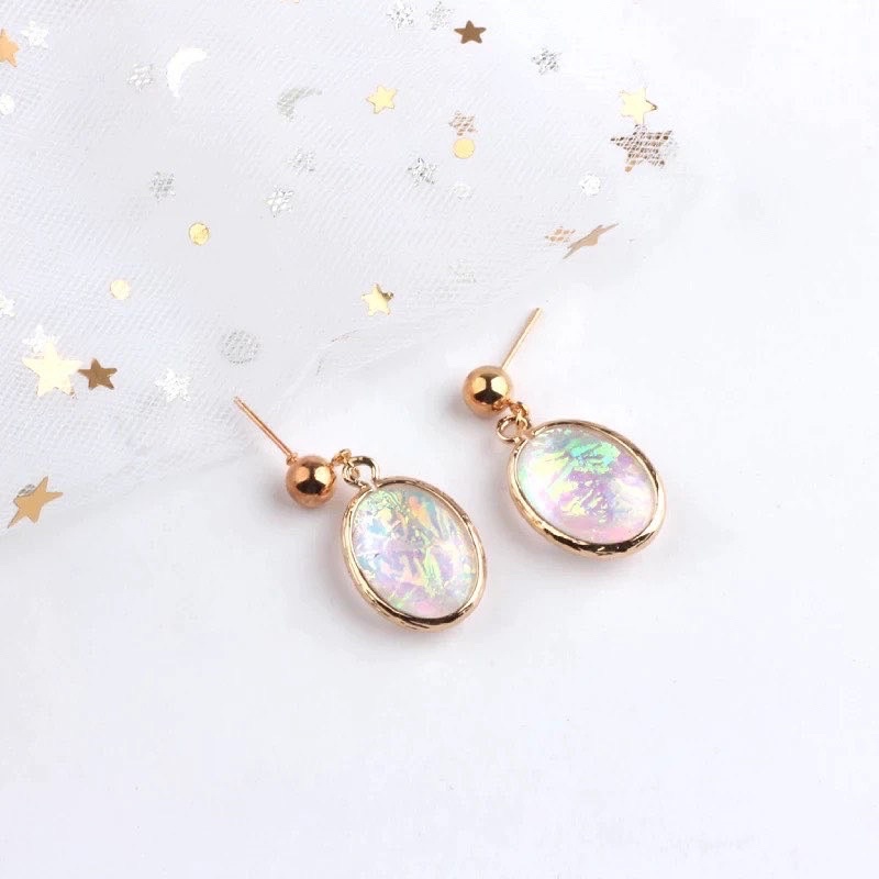Hoa tai thời trang Opal - Triple God