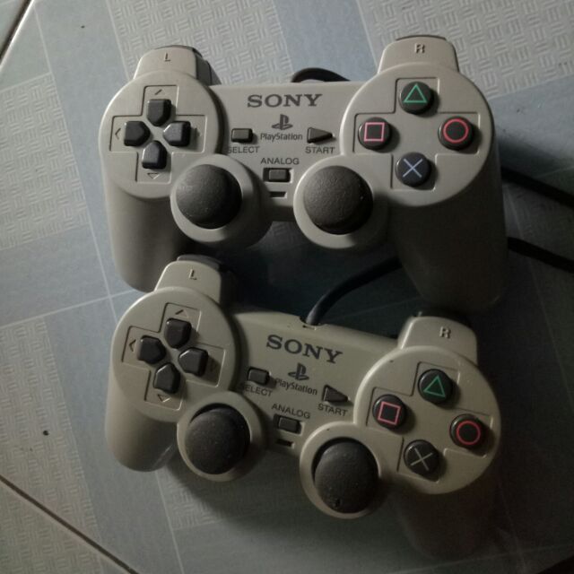 tay máy game playstation 1