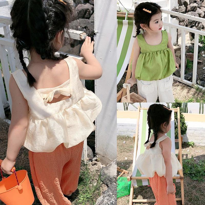Áo Hai Dây Hở Lưng Đính Nơ Phong Cách Hàn Quốc Thời Trang Mùa Hè Cho Bé Gái Từ 1 - 6 Tuổi