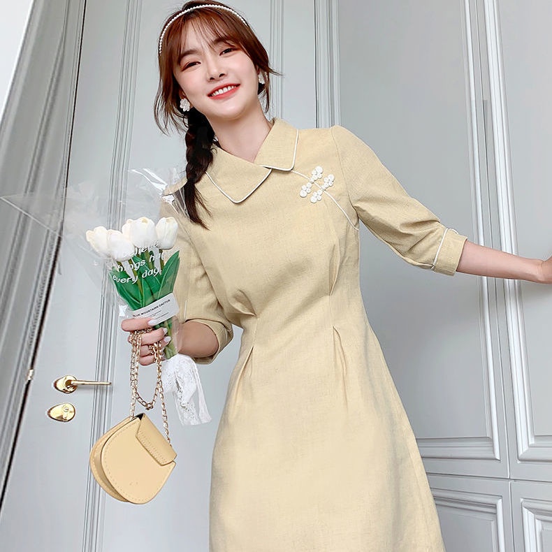 2022 Spring and Autumn New Cheongsam improved version of the small doll collar medium-long dress temperament waist shows a thin woman