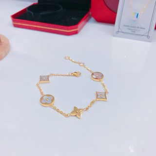 Lắc tay titan LV xà cừ