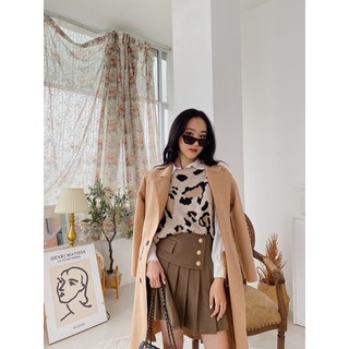 Chân váy xếp ly khuy dạ