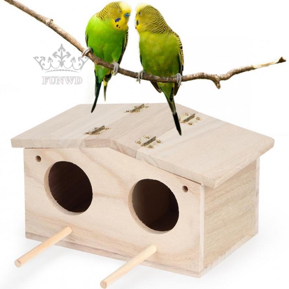 Ngôi nhà gỗ cho chim vẹt mới