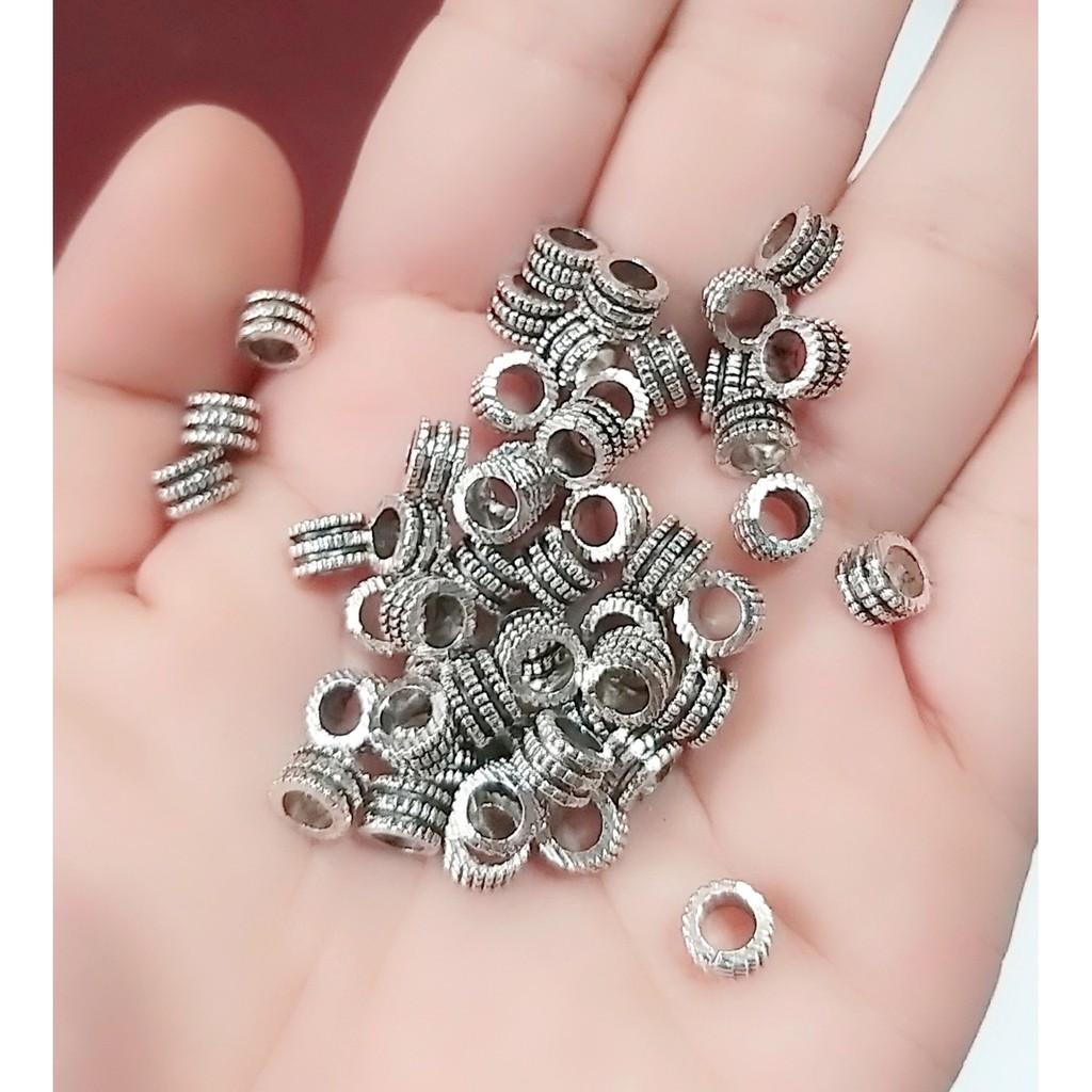 Sỉ charm bạc cổ : 50g / 1 gói = 23k [ Giá sỉ Charm ]