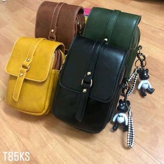 Túi đeo chéo qc kèm móc gấu