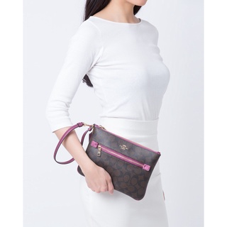 Ví cầm tay Coach Hhcogai