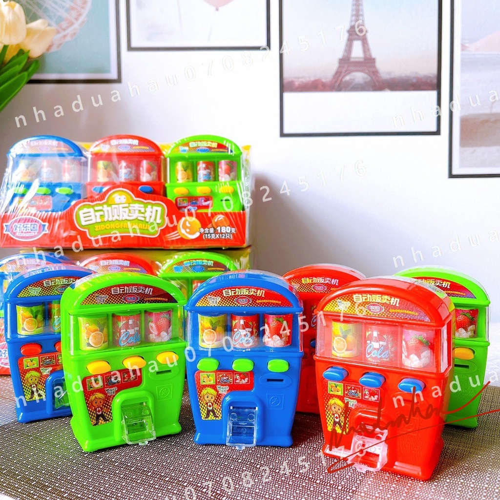 Máy bắn kẹo (có sẵn kẹo) hình máy bán hoa quả/ máy bán nước ngọt tự động Hongkong cái lớn 180gam