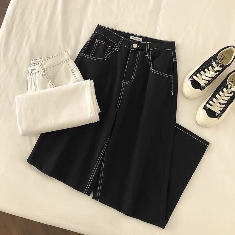 Quần jeans đen chỉ nổi trắng