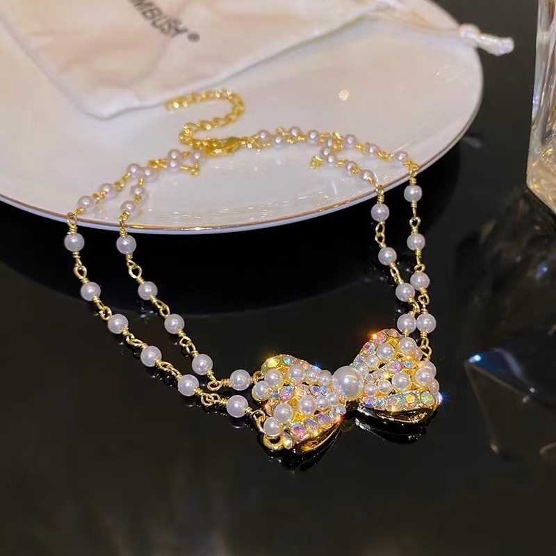 Vòng cổ Hai Lớp Thắt Nơ Đính Ngọc Trai Thời Trang Dành Cho Nữ