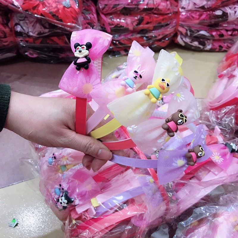 Sỉ 10 cài tóc nơ ren gắn các hoạ tiết hình thú xinh xắn cho các bé