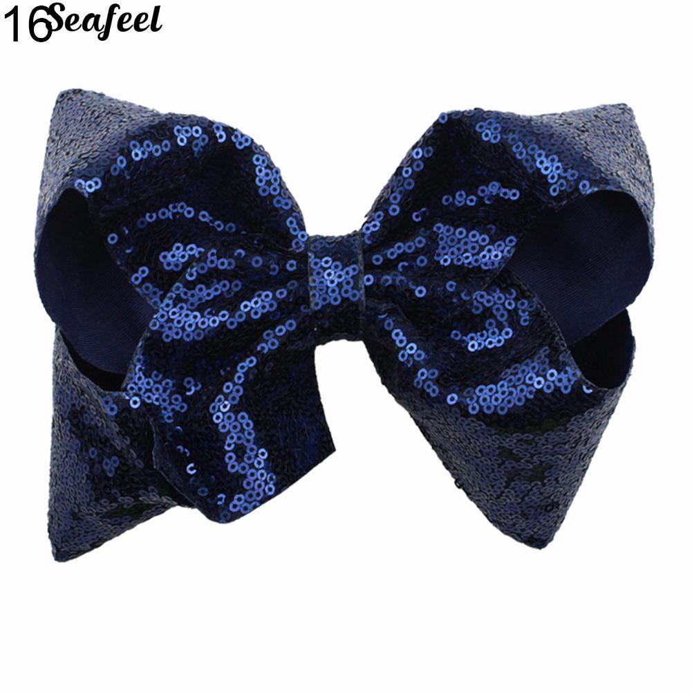 Kẹp tóc hình nơ đính sequin lấp lánh dễ thương dành cho nữ