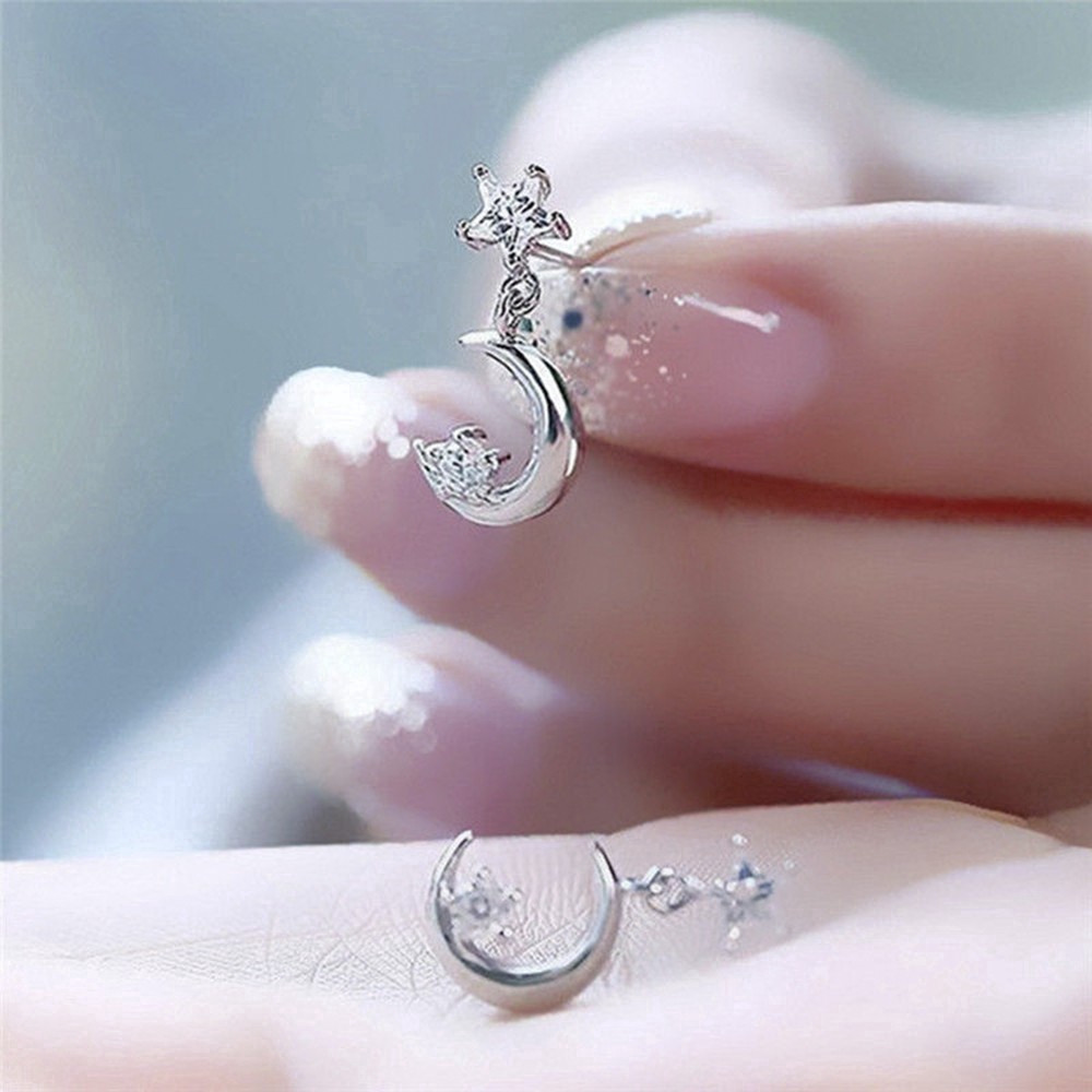 Bông tai màu bạc hình ngôi sao và mặt trăng đính đá pha lê dễ thương