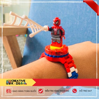 Đồng hồ tích hợp mô hình lego xoay nhiều mẫu Spiderman, Batman, Elsa, Kitty cho bé trai, bé gái (HeroWatch)