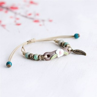 Vòng tay đất sét hoa charm chiếc lá