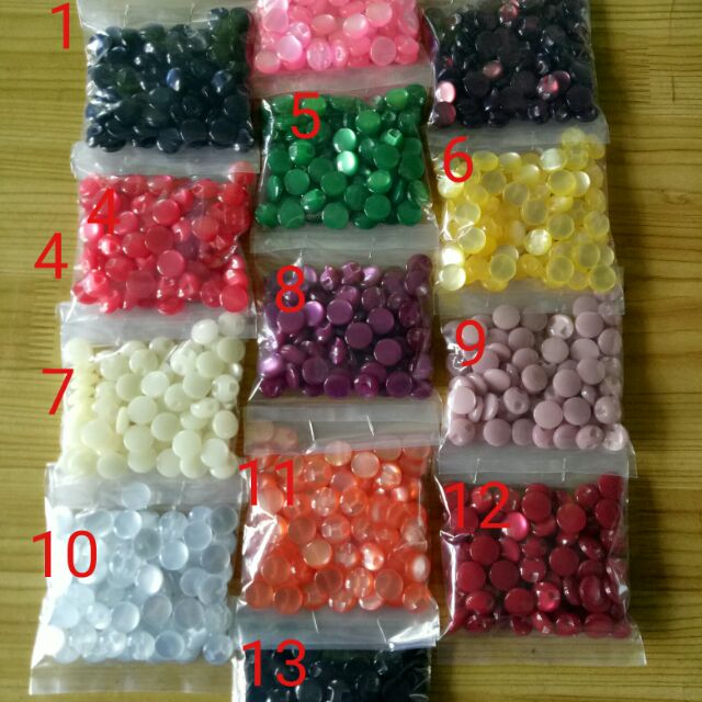 Nút  áo  sơ  mi 20k/1 bịch  50 nút