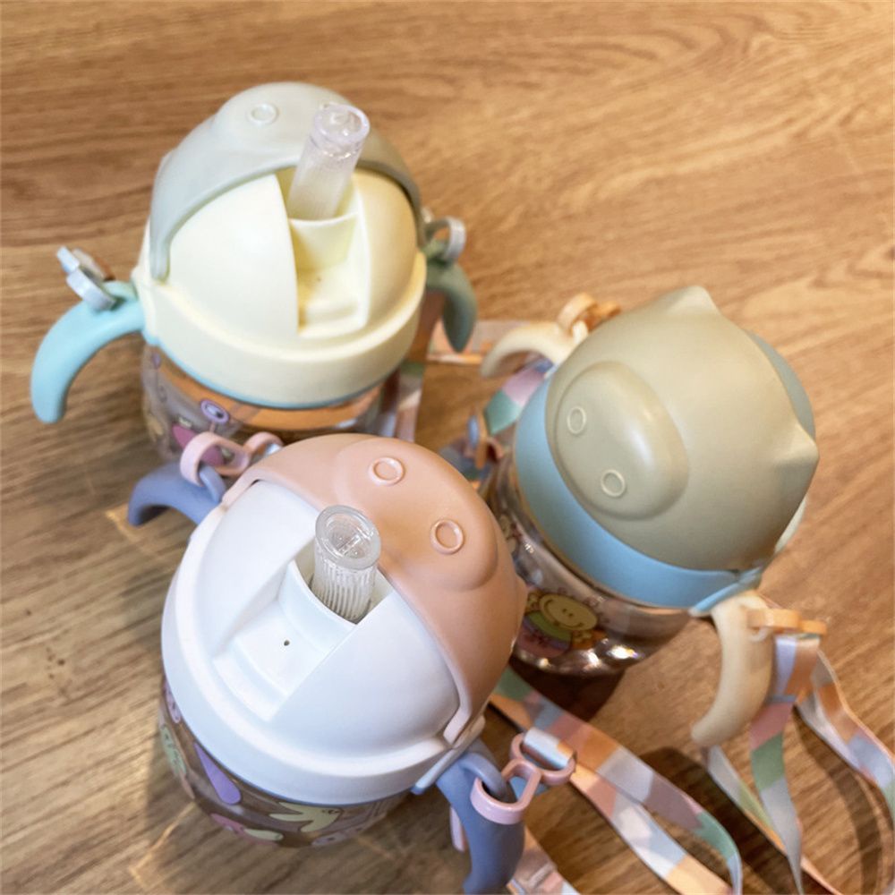 Bình uống nước 280ml có tay cầm và ống hút chống tràn họa tiết hoạt hình cho bé