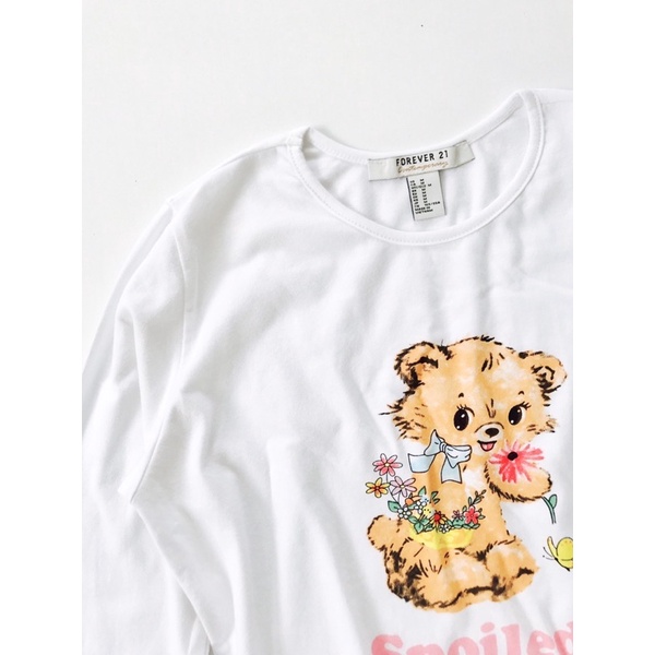 Áo croptop trắng dài tay xoăn lai in con gấu vnxk