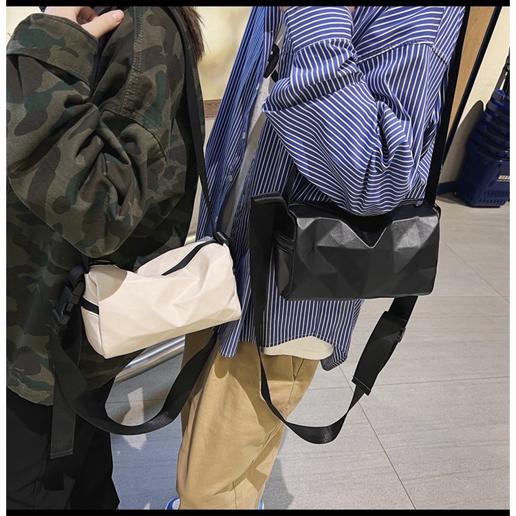 Túi xách nam nữ unisex đeo chéo trụ tròn cặp đôi cách điệu đen giỏ thời trang đeo hông phong cách MINAGRAM