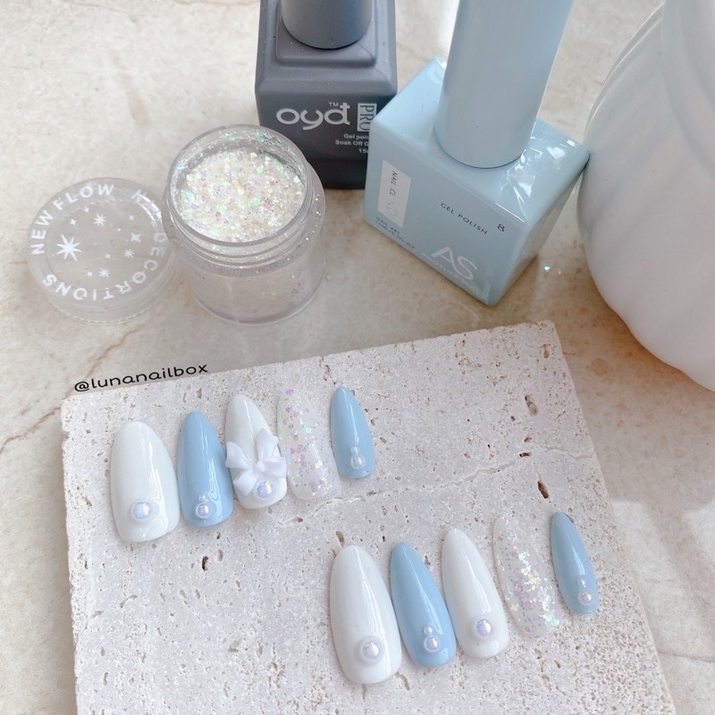 nail box nuna móng úp thiết kế móng tay màu xanh da trời đính nơ nhẹ nhàng. inbox dổi màu