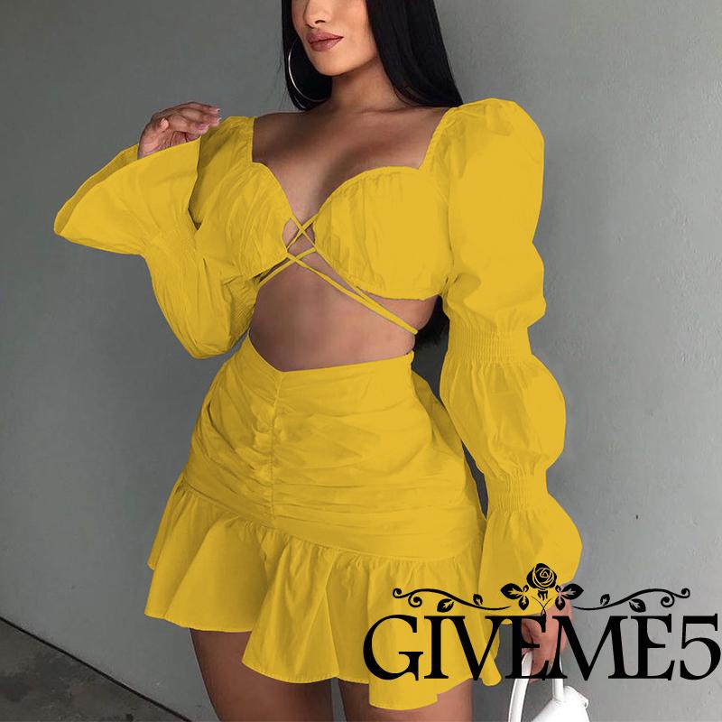 Set đồ 2 món gồm áo croptop cổ chữ v tay phồng màu sắc đơn giản + chân váy lưng cao xếp ly dành cho nữ