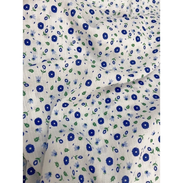 Vải boi kẻ chìm hoa xu tròn