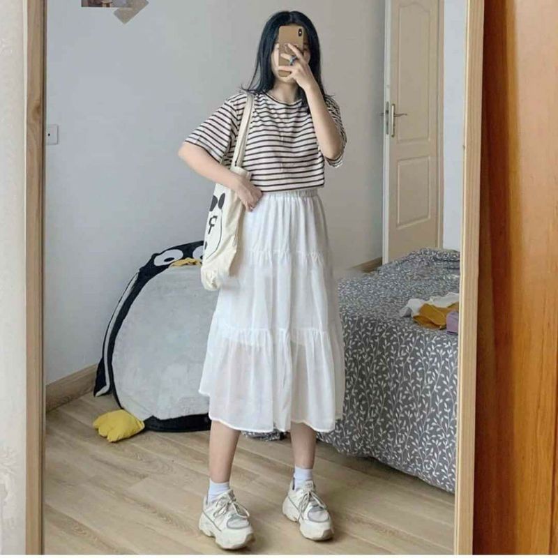 Chân váy voan nối tầng dáng dài.