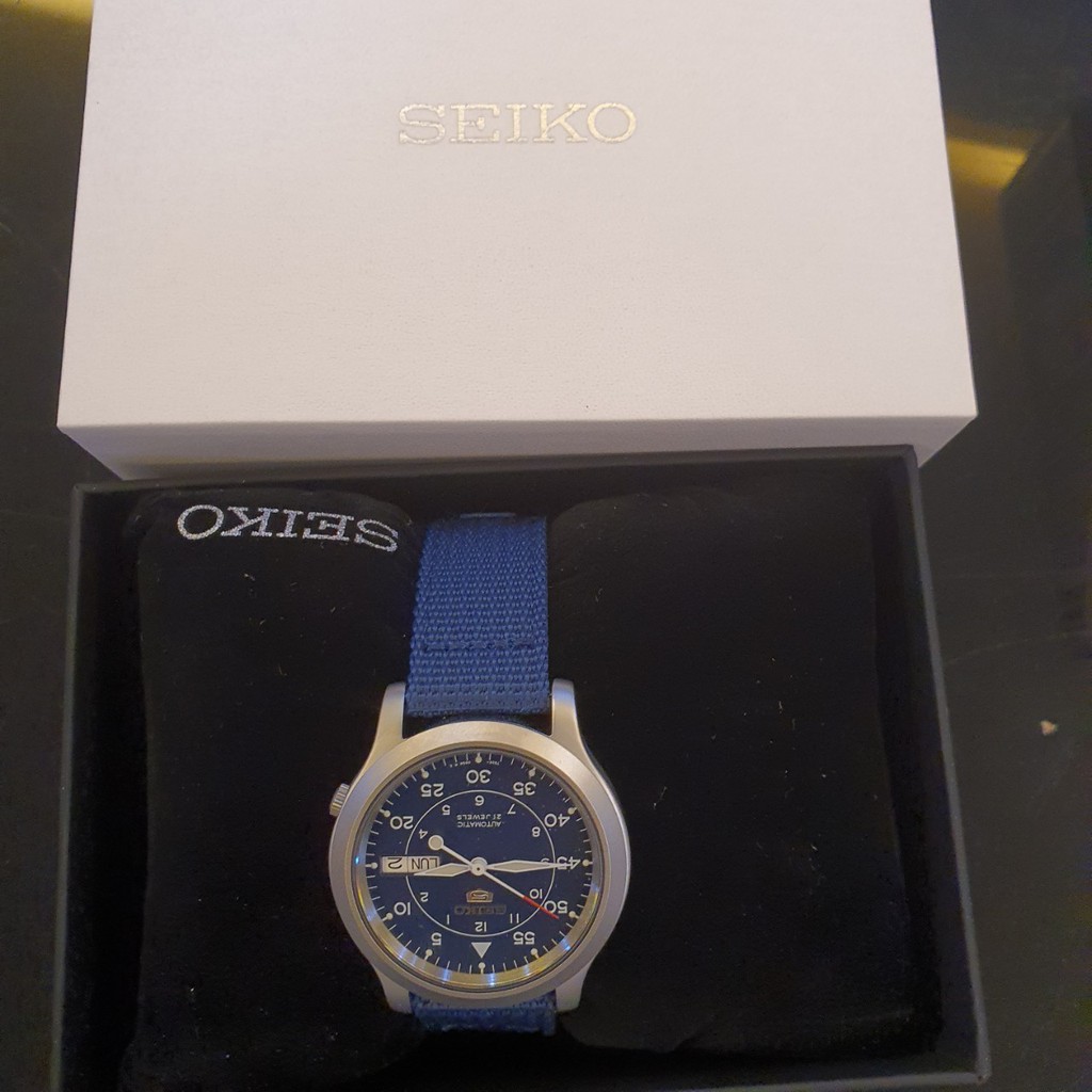 [Hàng xách tay Mỹ chính hãng] Đồng hồ nam hiệu Seiko 5 tự động SNK807 mặt thép không gỉ dây Blue Canvas bảo hành 3 tháng