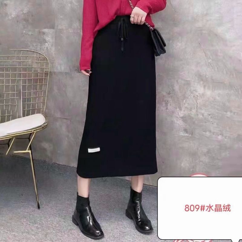 Chân váy len dáng dài QC đính logo có dây nơ