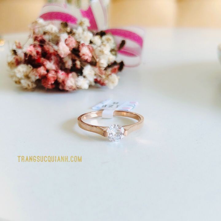 NHẪN TITAN VÀNG HỒNG HẠT ĐÁ
