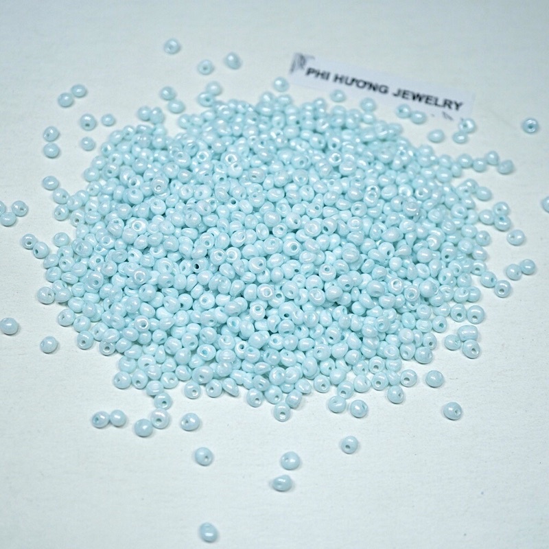 Gói 20gr hạt cuờm thuỷ tinh lệch lỗ 5mm