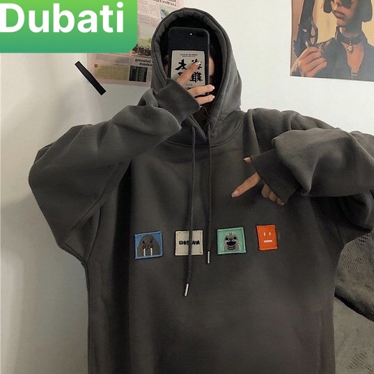 ÁO KHOÁC HOODIE HỌA TIẾT LOGO STICKERR NAM NỮ UNISEX CHẤT NỈ DÀY FROM RỘNG HOT TRENDD- DUBATI FASHION