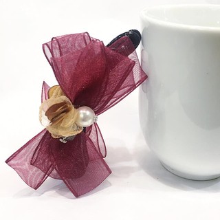 Cặp dọc nơ tạo phồng chân tóc