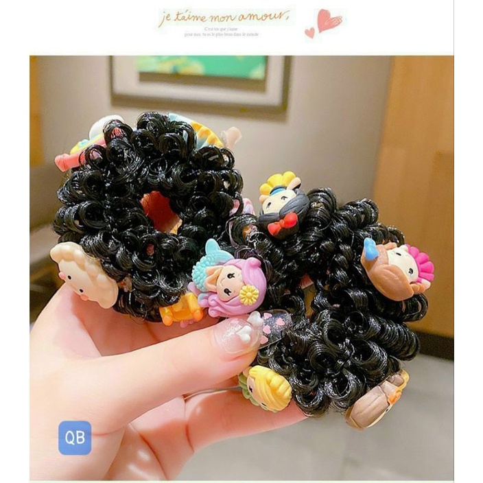 Dây búi tóc đính charm tạo kiểu cho bé.