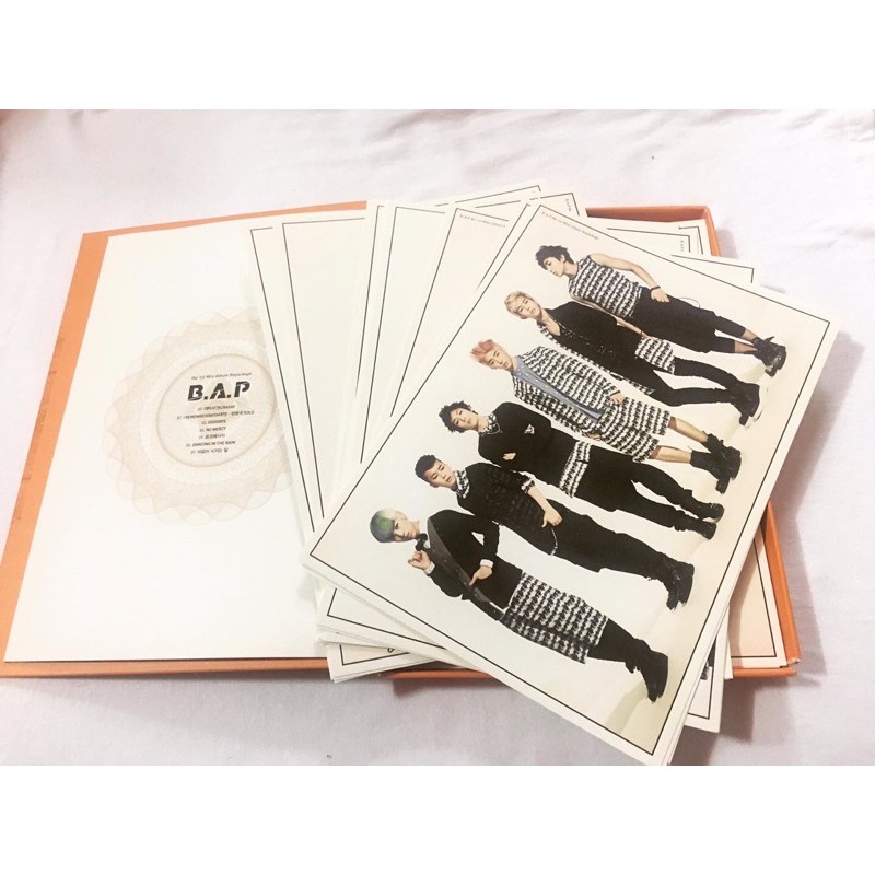 B.A.P 1st repackage Album đã khui seal, gồm cd và photobook rời như hình.