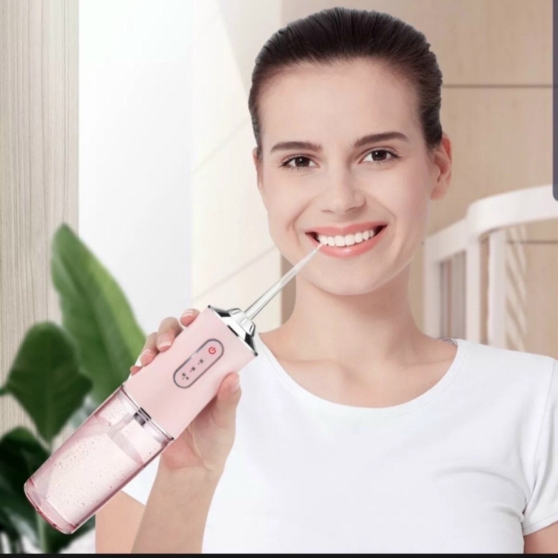 TĂM NƯỚC 4 ĐẦU ORAL IRRIGATOR HÀNG NHẬP ( tặng kèm 4 đầu tăm thay thế- áp lực nước vượt trội).alien