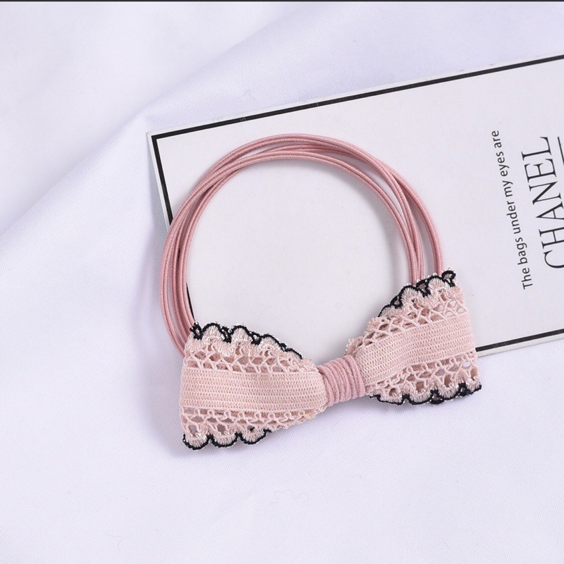 Thun buộc tóc hình nơ