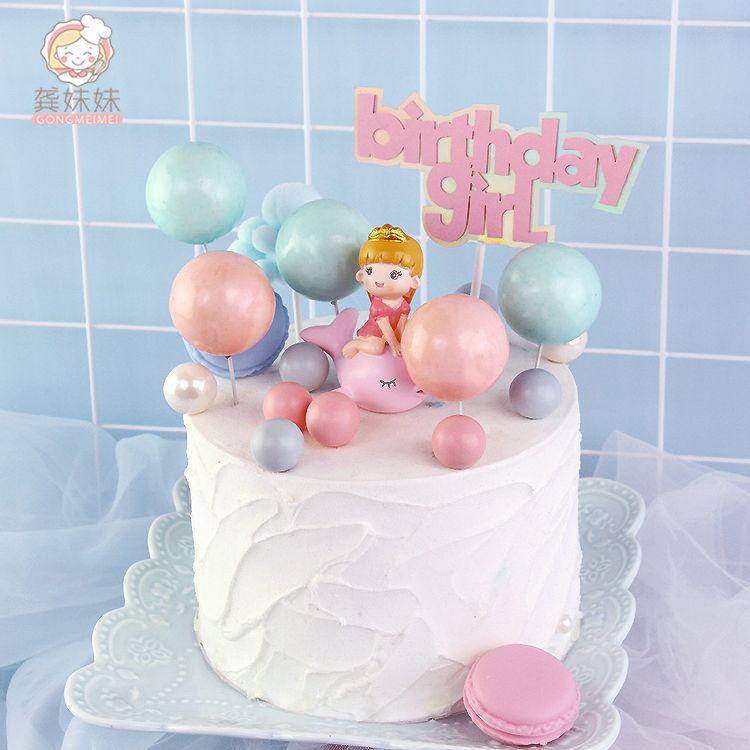 Trang trí bé trai cưỡi cá heo