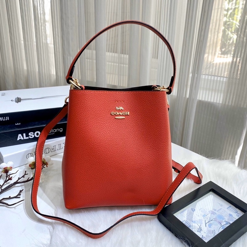 Túi đeo vai kèm dây đeo chéo Co@ch bucket