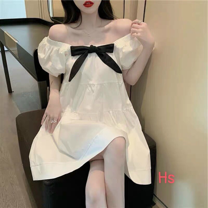 Váy đầm nữ dáng babydoll trắng tay búp có nơ đen trước ngực dễ thương