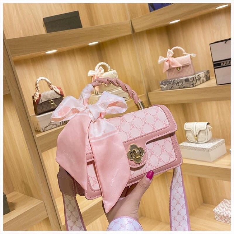 Túi xách nữ L.V có quai cầm kèm dây nơ T320