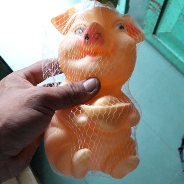 Chú Heo bóp kêu bằng nhựa cầm vàng