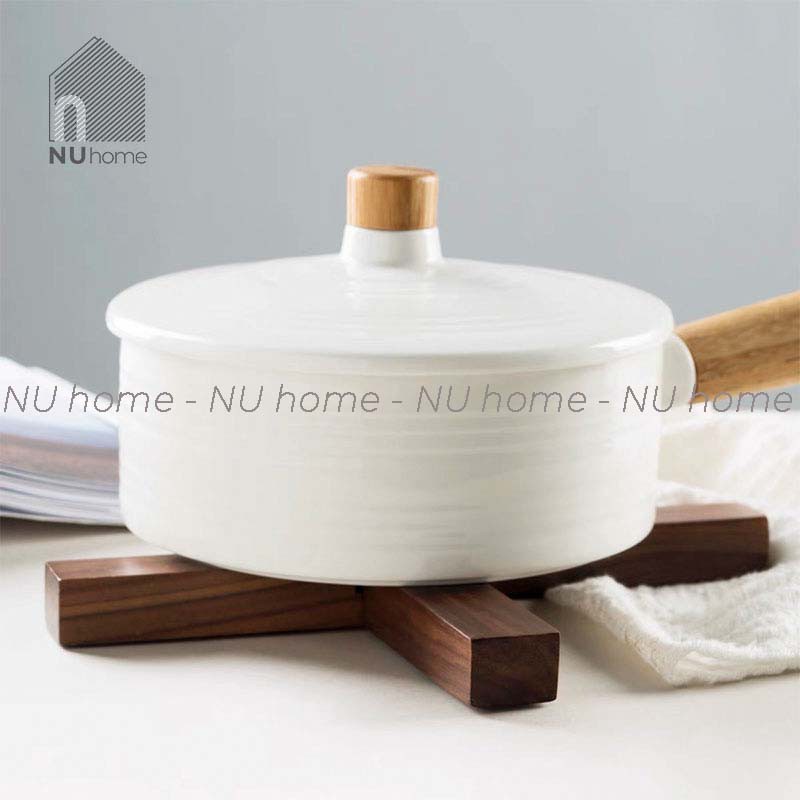 nuhome.vn | Đế lót nồi chữ X thiết kế đơn giản, phong cách mộc mạc với chất liệu bằng gỗ tự nhiên chiụ được nhiệt độ cao