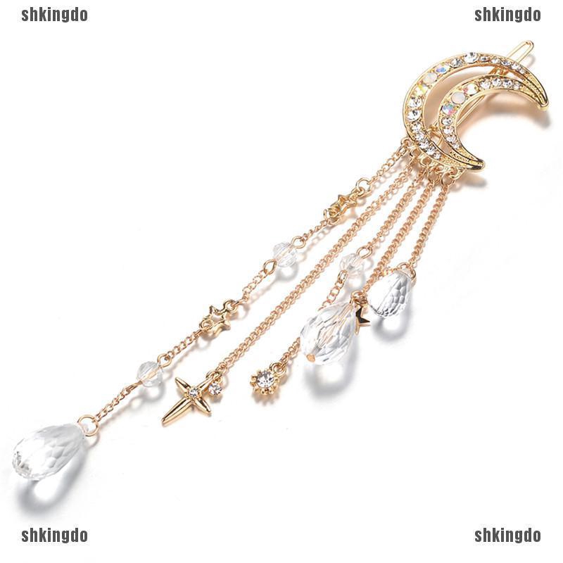 Kẹp tóc hình mặt trăng đính pha lê phối tua rua dài thời trang