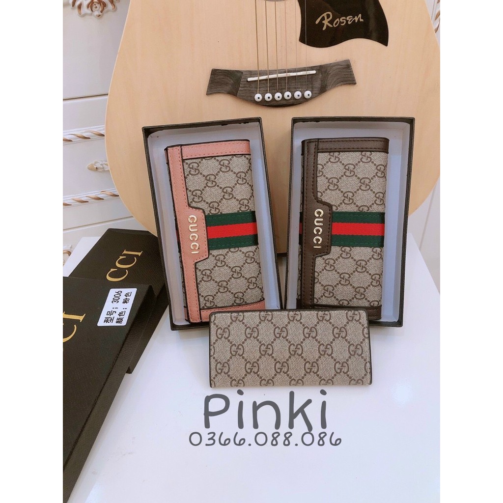 Bóp Gucci cầm tay