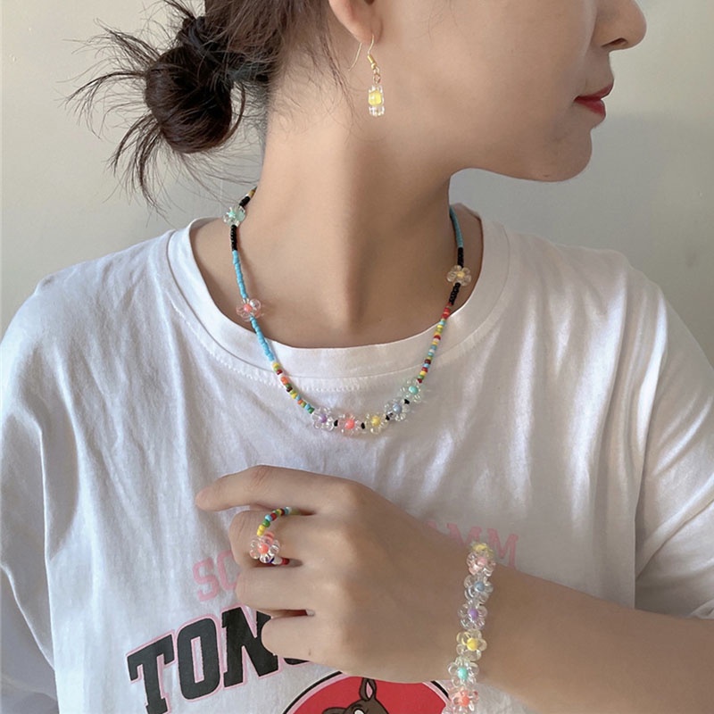 Bộ 50 Hạt Nhựa Trong Suốt Hình Hoa Hướng Dương Kích Thước 12mm Dùng Làm Trang Sức Thủ Công